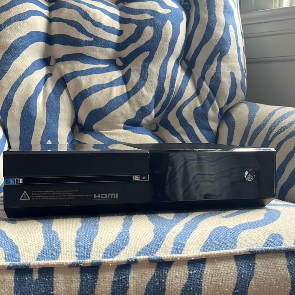 Xbox One is Still in Great Condition and has HDMI Cord With it and Xbox Cord